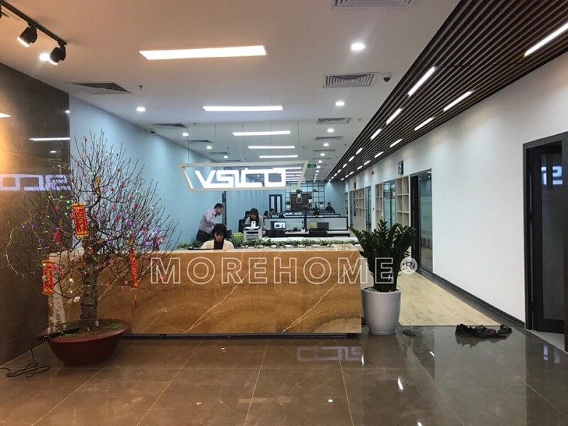 Sử dụng đá tự nhiên màu vàng ốp quần lễ tân văn phòng tạo điểm nhấn nổi bật cho không gian làm việc Đá tự nhiên